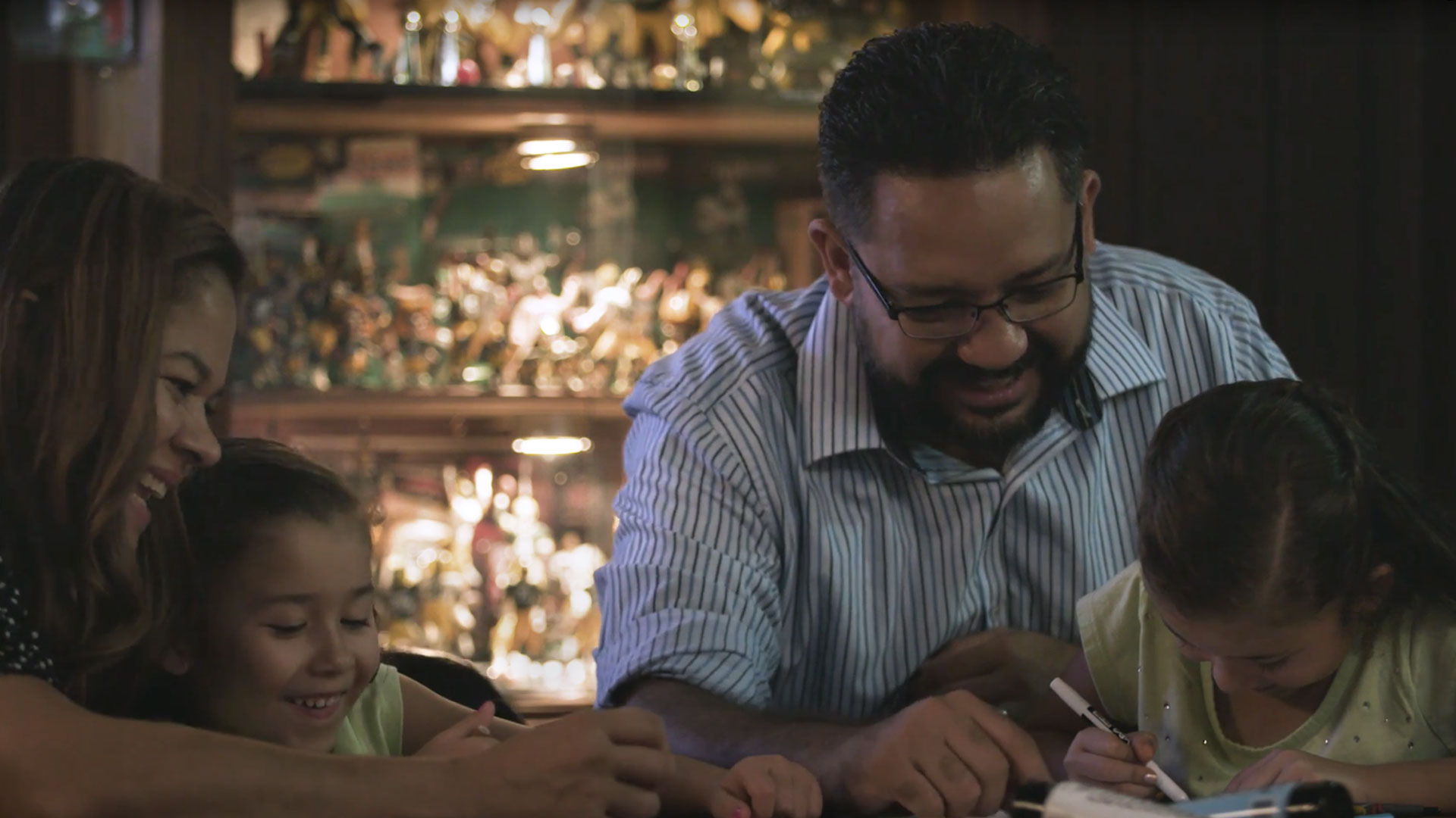 Armando, an Art Director at GMR Marketing, teaches his two daughters how to draw